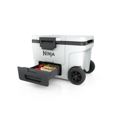 Ninja FrostVault Glacière robuste et isotherme, avec roues et tiroir de stockage à sec Dry Zone, conserve la glace plusieurs jours, capacité jusqu’à 68 canettes, Blanc Nuage, FB245EUWH